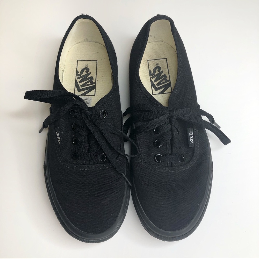 Black lace up Vans shoes